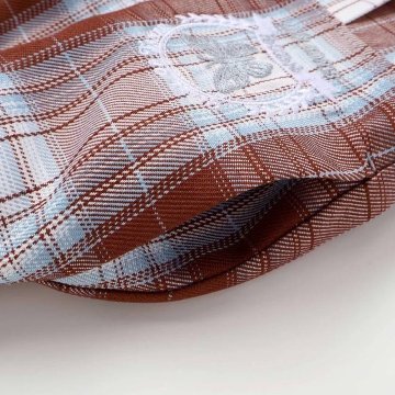 nexchic (ネクシック) 「エンブレム刺繍入りチェック柄プリーツスカパン」(120-150cm) の画像