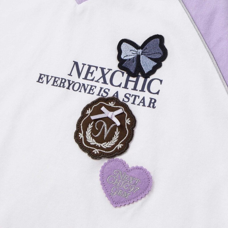 nexchic (ネクシック) 「ロゴワッペン付きラグラン長袖Tシャツ」(110-150cm) の画像
