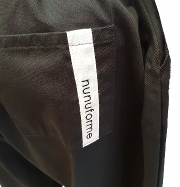 nunuforme ヌヌフォルム 「ヘムタッグカーブパンツ」(size1,2)の画像