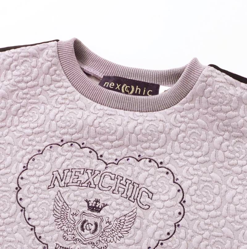 nexchic (ネクシック) 「ハート刺しゅう袖リボンキルトトレーナー」(110-150cm) の画像