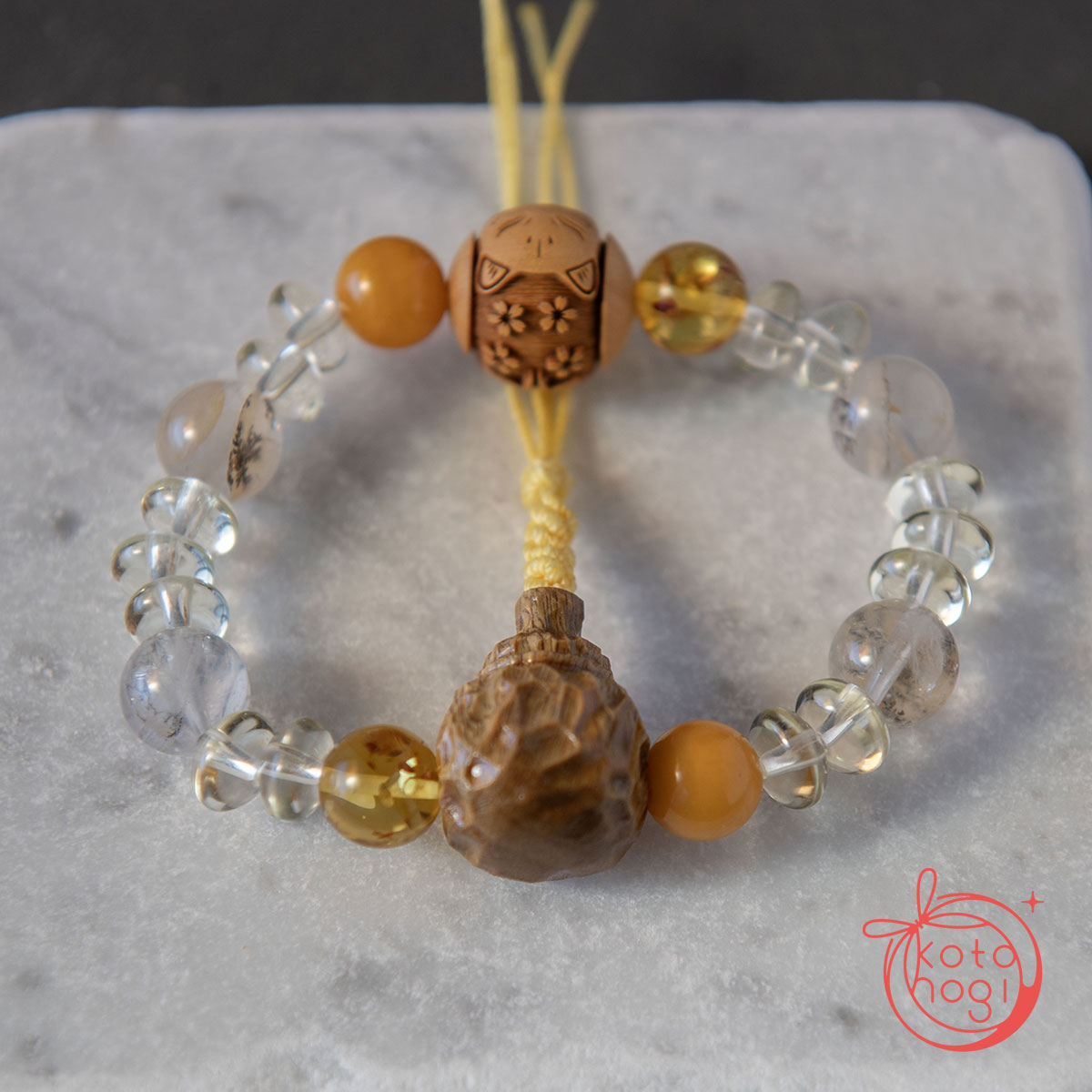 九尾の狐と稲荷面のお守りブレスレット「甘露」檀香樹 柘植 ハニーアンバー バルティックアンバー デンドリティッククォーツ レモンクォーツの画像
