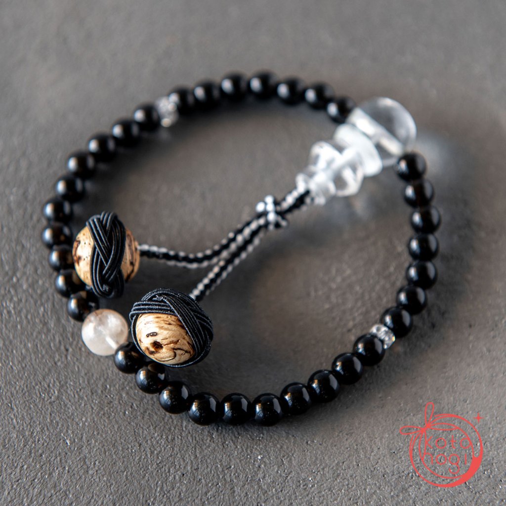 魔除けと浄化のお守り数珠・念珠「ひとえ」 チベット産モリオン ガネーシュヒマール ガーデンクォーツの画像