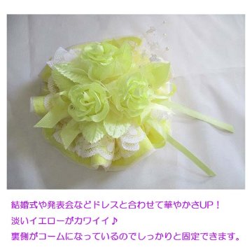 黄色の大きなお花のコーム　ドレスに合わせての画像