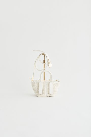 Piacere feather ecruの画像